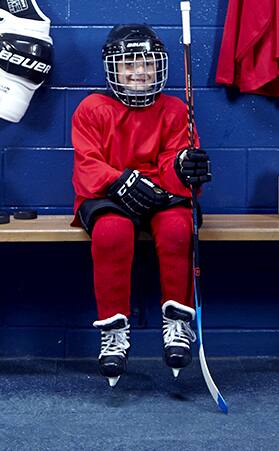 How to put on protective hockey gear Image