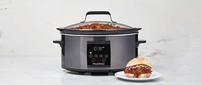 A black Paderno programmable slow cooker.