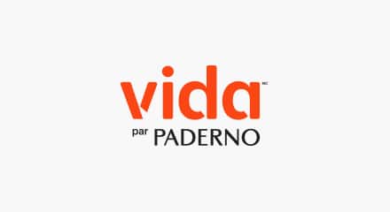 Le logo Vida par PADERNO : Un mot-symbole rouge « Vida » et un mot-symbole noir « PADERNO » avec les mots « by/par » placés entre les deux.