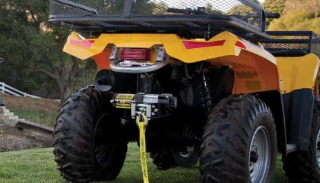 A winch attached to the back of an ATV. 