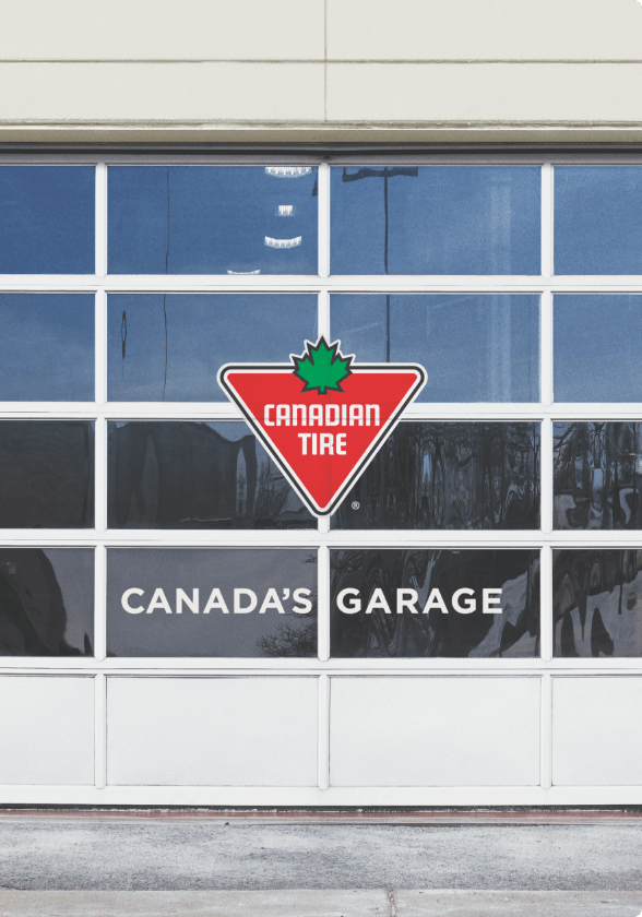 Canadian Tire auto service centre garage door with signage reading “Canada’s Garage”.