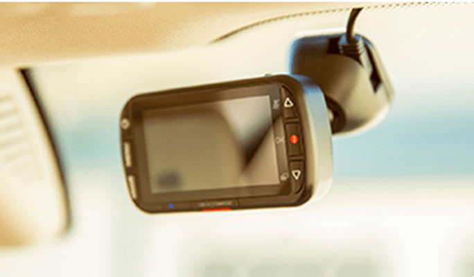 Windshield-mounted camera inside a vehicle.