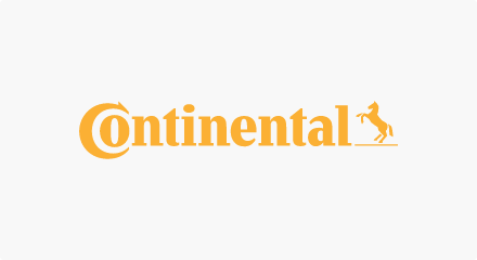 The Continental logo: A yellow “Continental” wordmark with the letter “o” inside the hollow of the letter “C” all to the left of a rampant horse.
