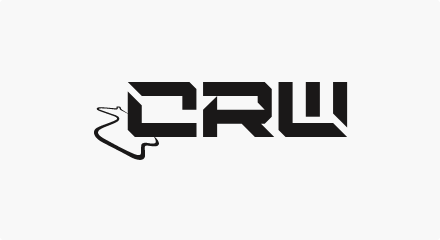 The CRW logo: A black “CRW” wordmark with notches cut out of each letter, all to the left of a small graphic of a racetrack.