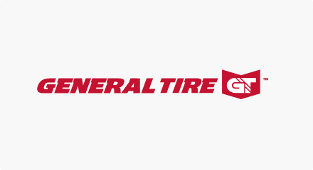 The General Tire logo: A red “GENERAL TIRE” wordmark to the left of a red badge containing interlocking white “G” and “T” letters.