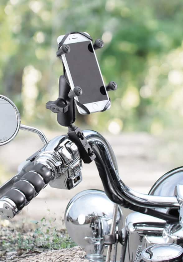 Motorcycle with a GPS device on the road.