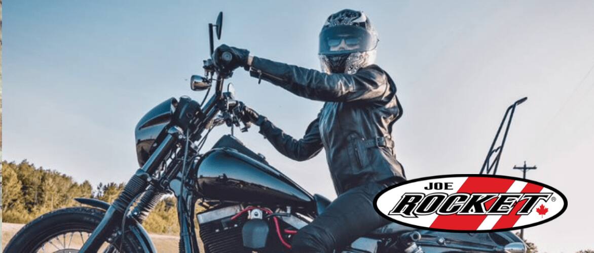 Person on a black motorcycle wearing Joe Rocket apparel.