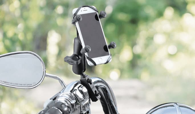 A mobile phone securely fastened on a mount. 