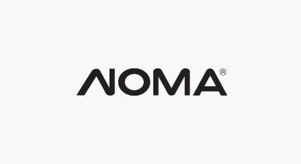 The NOMA logo: A stylized “NOMA” wordmark in black.
