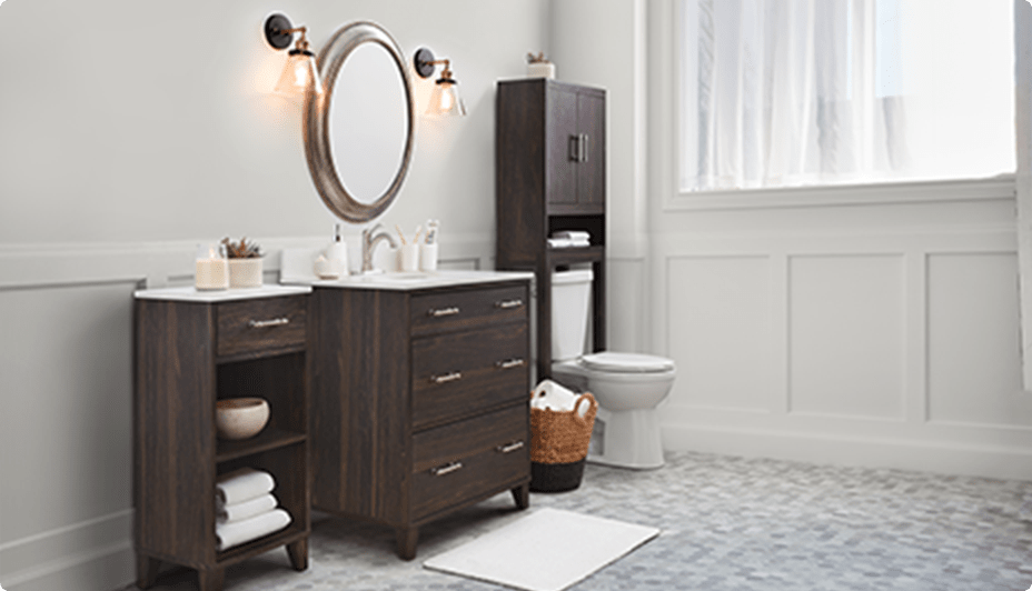  Canvas saxton bathroom floor cabinet, bathroom vanity, and dark wood over-the-toilet storage cabinet.