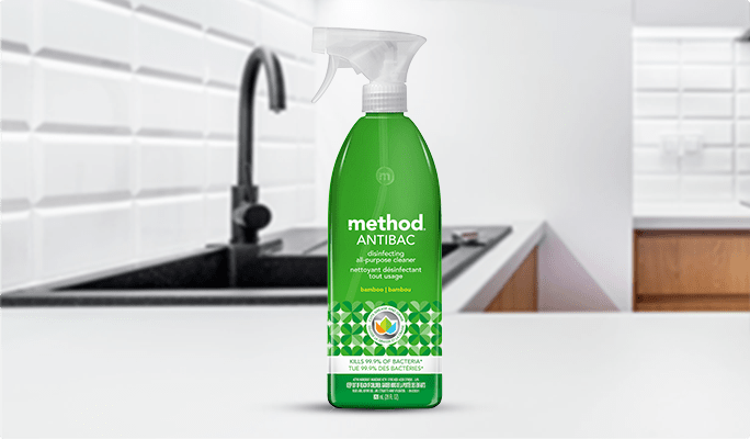 A bottle of method antibacterial kitchen cleaner.