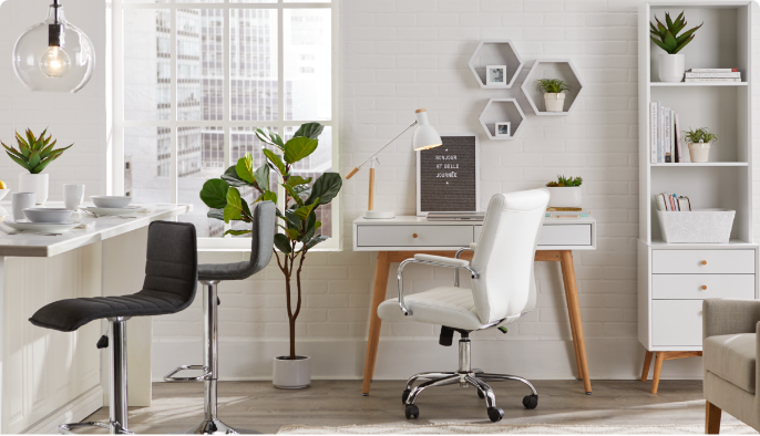 Large home office space with multiple desks, chairs, and shelving unit