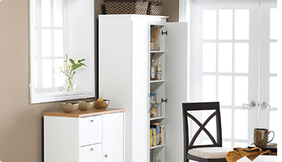 White 3-compartment storage cabinet and white 2-door pantry cabinet in a kitchen.