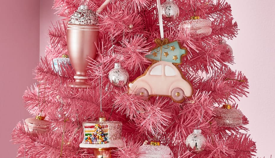 Canvas pink Christmas tree with Brights collection of ornaments.