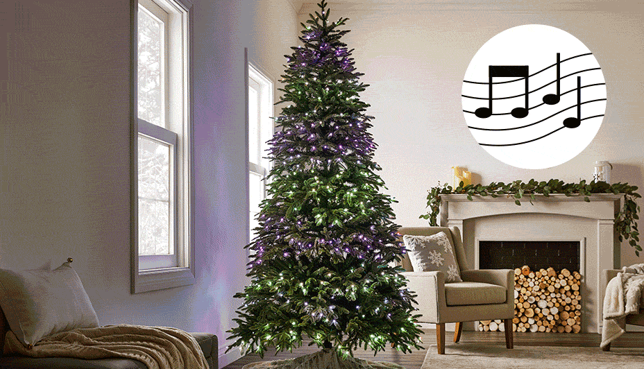 NOMA Advanced Aurora Music & Light Show Christmas Tree lit up displaying purple and green lights.