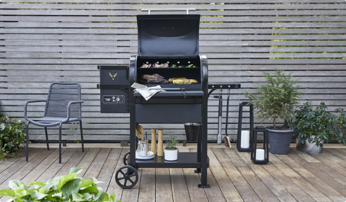 Outdoor all black BBQ with cooking accessories