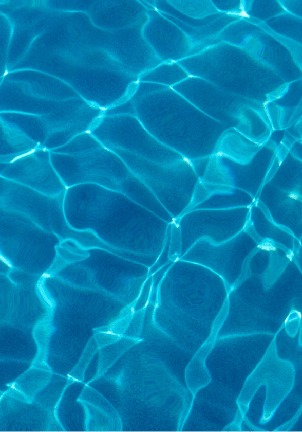 A closeup of water inside a swimming pool.