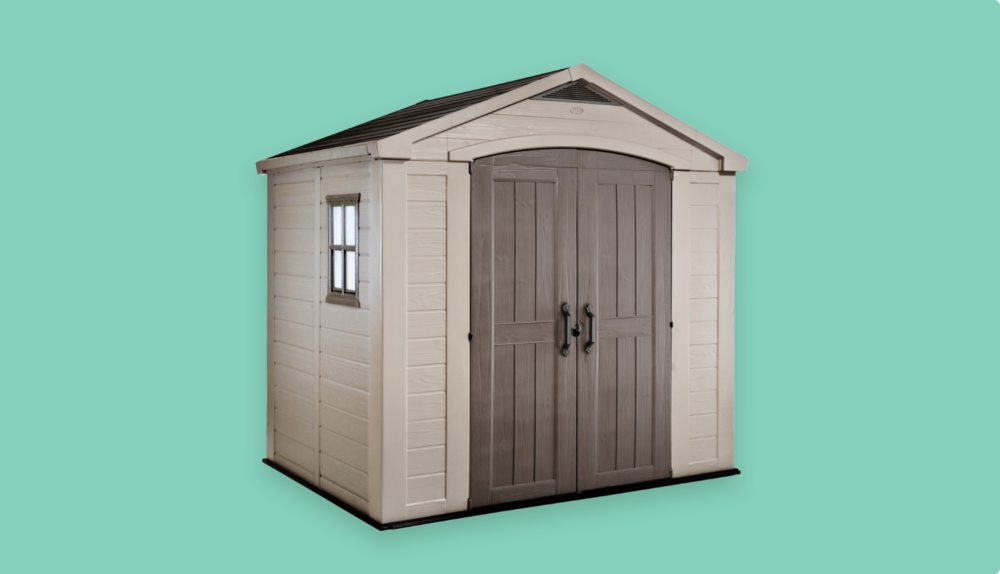 A white-and-grey ten-foot-by-8-foot Stronghold Outdoor Storage Shed on a green background.