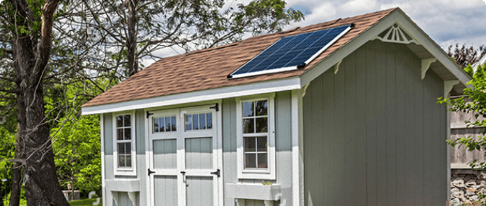 Solar panel on shed rooftop