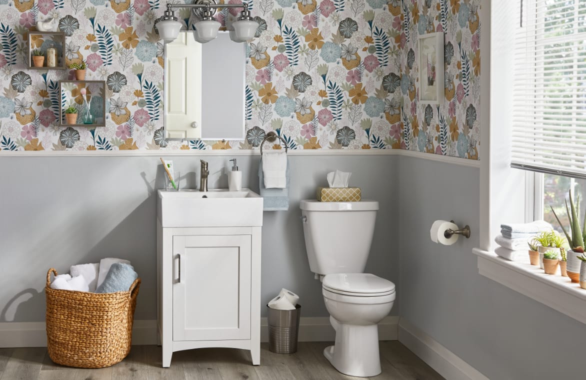 Attractive floral wallpaper on a bathroom wall. 