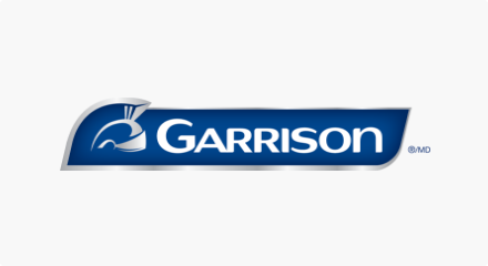 The Garrison logo: A stylized silver Roman soldier's helmet to the left of a white “Garrison” wordmark, all inside a blue rhombus.