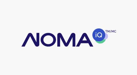 The NOMA iQ logo: A stylized “NOMA” wordmark in dark blue to the left of a dark-blue circle with “iQ” inside in white text