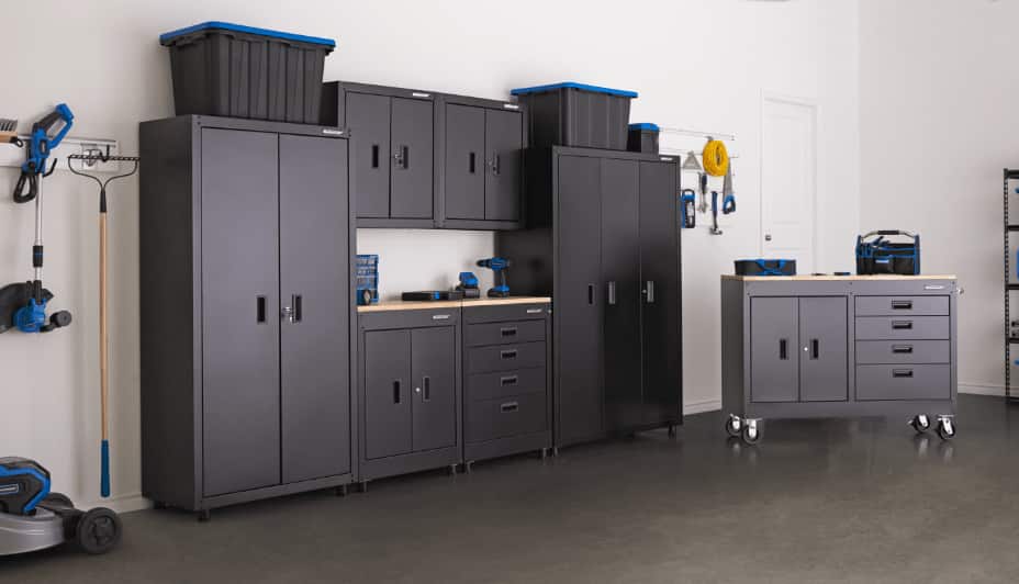 Two tall cabinets, two-door base cabinet, four-drawer base cabinet, locker, and two wall cabinets from Mastercraft Diamond series in a garage.
