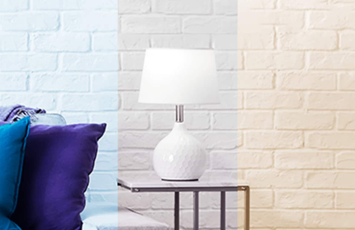 Lamp on a side table next to a sofa