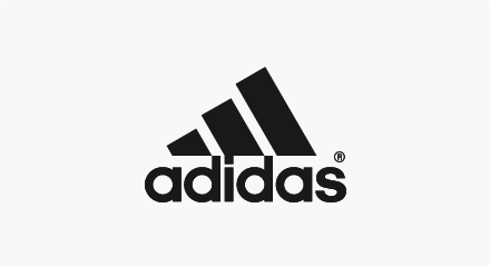 The adidas logo: A black pyramid shape formed by three thick diagonal lines above an “adidas” wordmark.