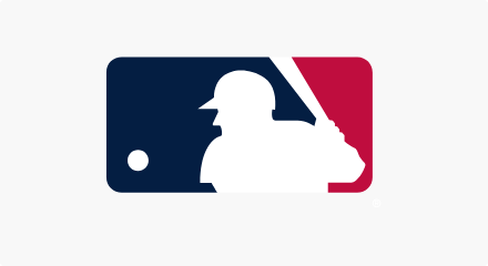 The Major League Baseball logo: A white silhouette of a batter and ball flanked in red and blue.
