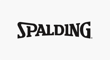 The Spalding logo: A black concave “SPALDING” wordmark.