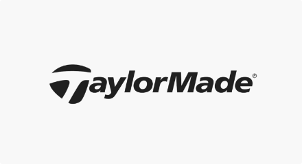 Le logo de la société TaylorMade Golf Company : Un mot-symbole noir «TaylorMade» avec un T stylisé.