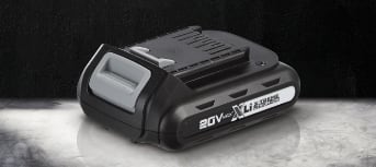 Single 20 volt power tool battery placed on a grey, steel-like surface with a black background. 