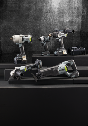 A selection of five power tools from the MAXIMUM brand positioned in various spots against a black and dark grey background. 