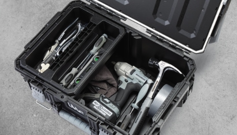 Tools, work gloves and supplies inside a MAXIMUM BRIX modular toolbox storage system.