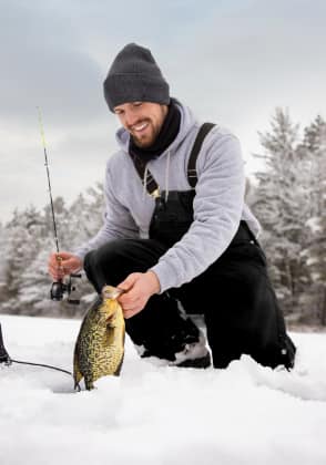 Man holding a big fish. 