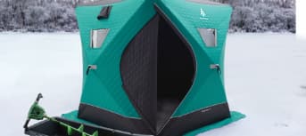  A green coloured thermal ice shelter.