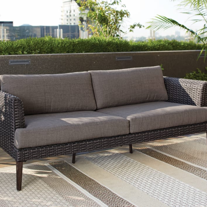 CANVAS Jensen conversation collection patio couch kept in a rooftop patio. 