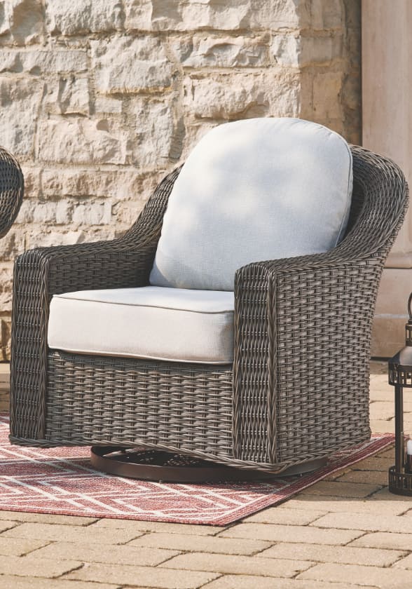 CANVAS Summerhill Swivel and Glider Motion Chair on a patio.