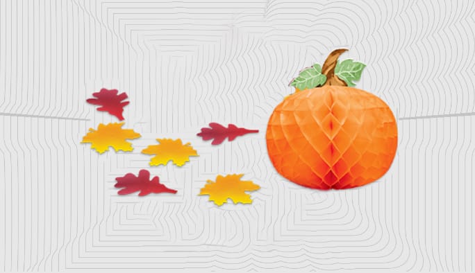 Des décorations de citrouille  3D avec des décorations de feuilles d’automne.  