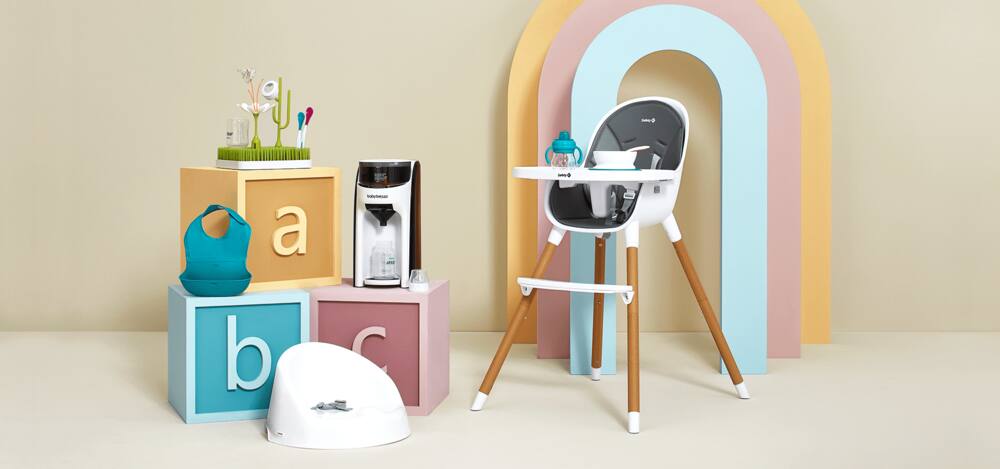 An Evenflo Revolve360 car seat, Storkcraft Modern Pacific convertible baby crib, and Ingenuity Cozy Spot Reversible Duvet gym.