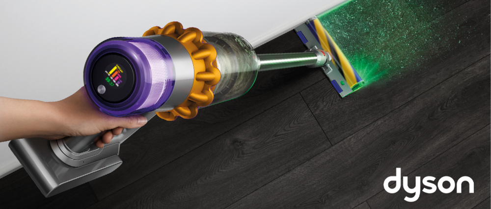 Person cleaning floor with Dyson V15 Detect Total Clean Vacuum 