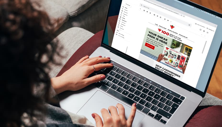 Woman on a laptop shopping Canadian Tire website and email sign up