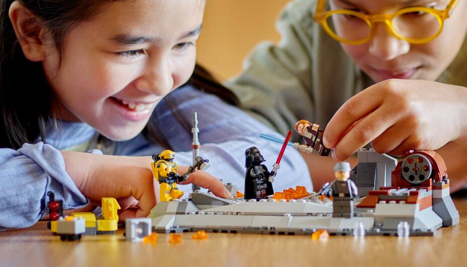 Kids playing with Star Wars Lego