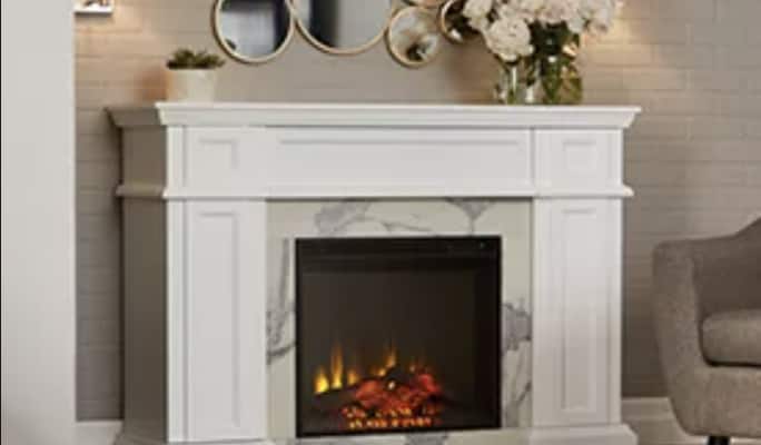 White marble electric fireplace with circle mirrors on wall