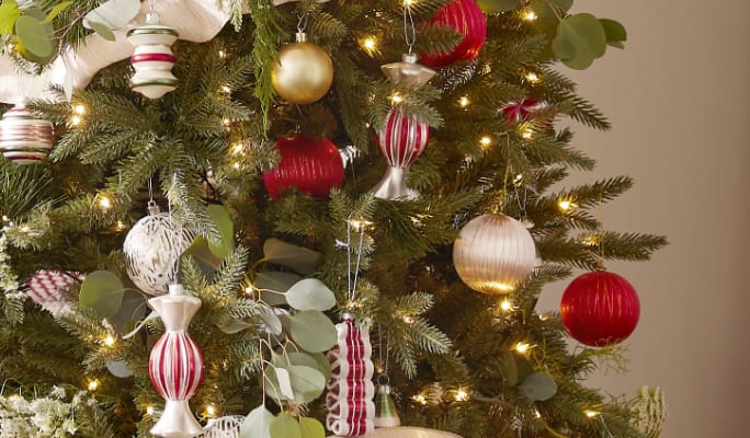 Christmas tree decorated with Jillian Harris & CANVAS holiday collection ornaments