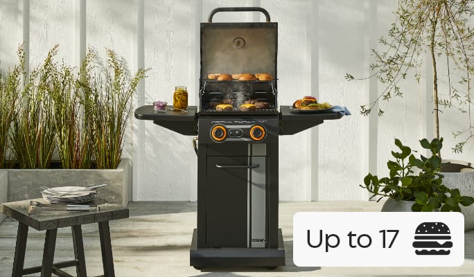 Master Chef Grill Turismo 2-Burner BBQ grilling burgers on patio.
