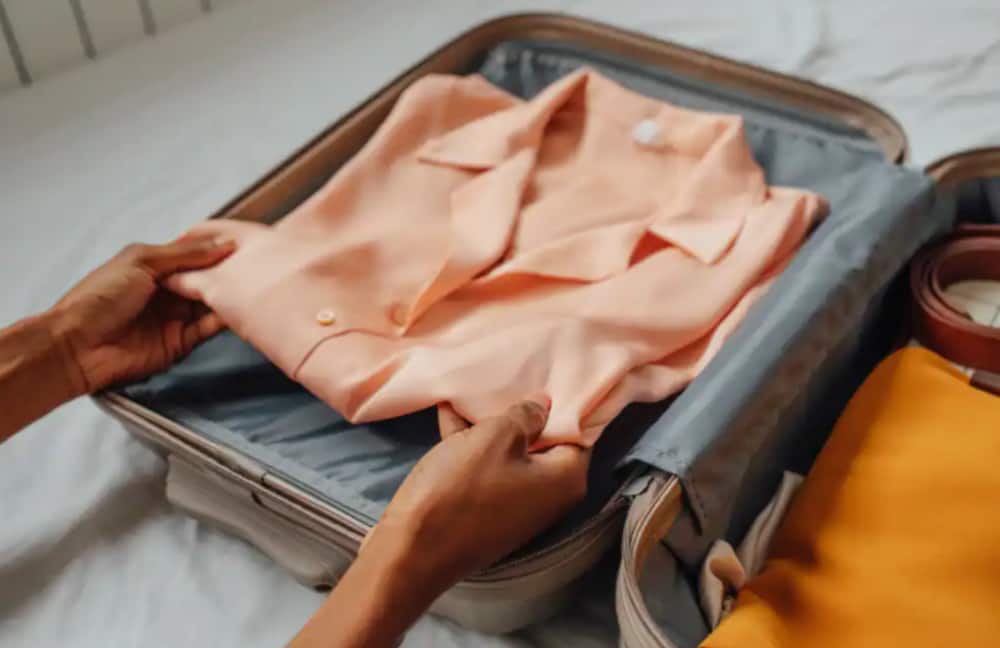Folded shirt in an open suitcase