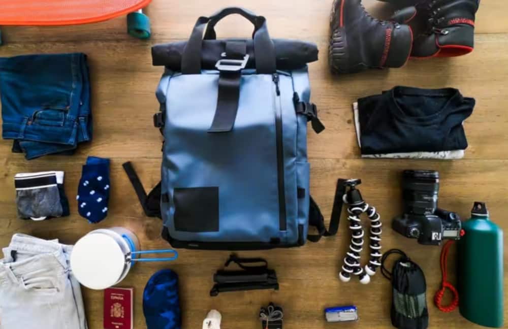 Backpack and travel gear on the floor
