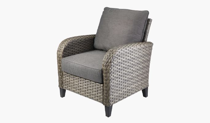 Wicker patio armchair with grey cushions